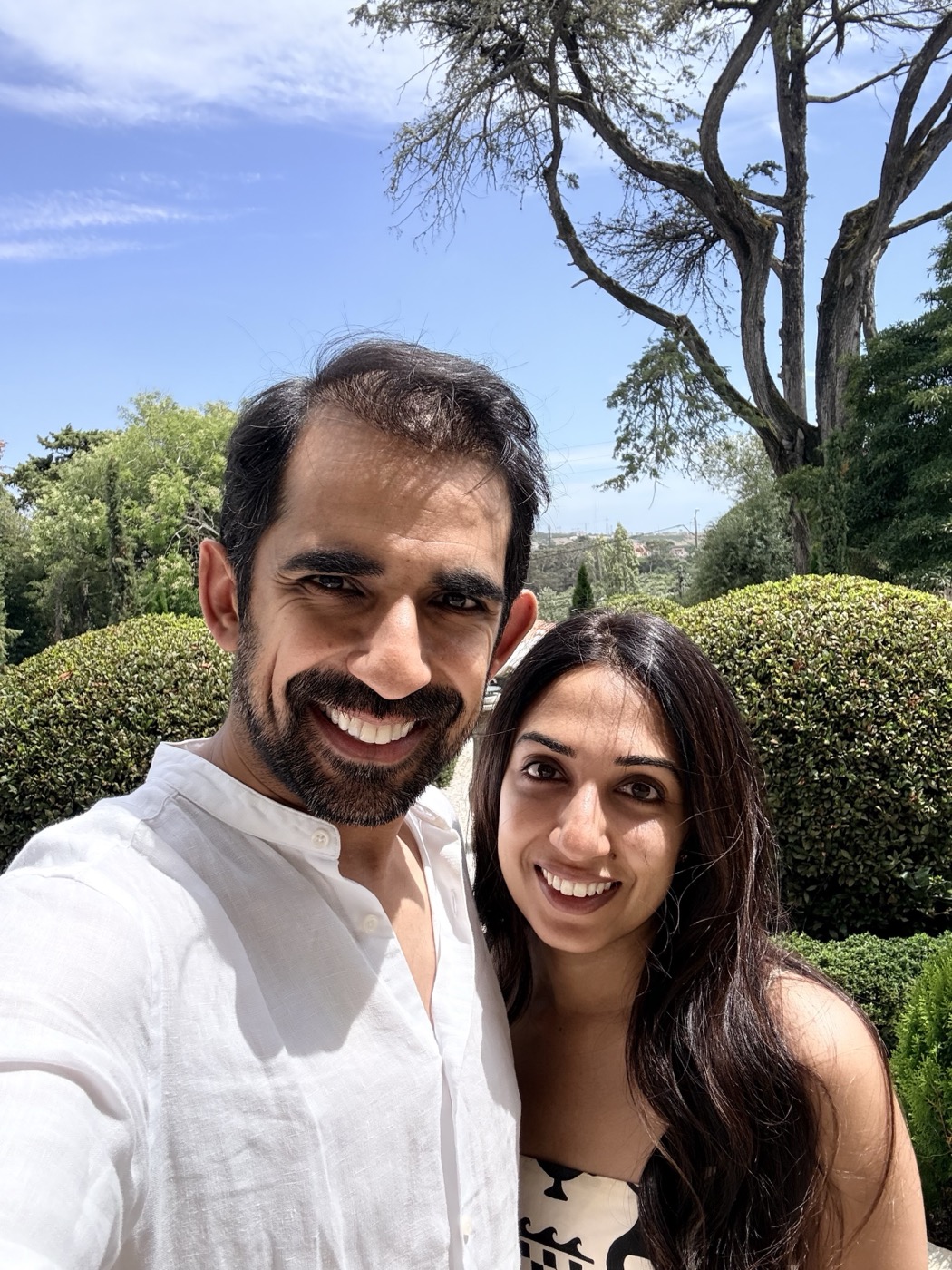 Tanya and Kunal in a garden near Lisbon